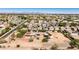Overhead shot of the property with mature landscaping and location within a residential area at 1851 E Campo Bello Dr, Phoenix, AZ 85022