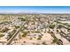 Spacious neighborhood with an aerial view showcasing tree-lined streets and well-maintained homes in a desert setting at 1851 E Campo Bello Dr, Phoenix, AZ 85022