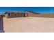Expansive dirt backyard with covered patio, ready for a pool at 18773 E Panchito Dr, Gold Canyon, AZ 85118