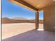 Covered patio overlooking expansive dirt backyard with block wall at 18773 E Panchito Dr, Gold Canyon, AZ 85118