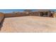 Expansive dirt backyard features block wall for privacy at 18773 E Panchito Dr, Gold Canyon, AZ 85118