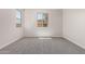 Bright bedroom featuring carpet floors and a large window at 18773 E Panchito Dr, Gold Canyon, AZ 85118
