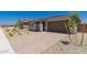 Beautiful front yard features pavers, stone veneer, and lush landscaping at 18773 E Panchito Dr, Gold Canyon, AZ 85118