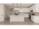 Bright kitchen featuring white cabinets, stainless steel appliances, and a large island at 18773 E Panchito Dr, Gold Canyon, AZ 85118