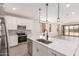 Bright kitchen featuring white cabinets, stainless steel appliances, and eat in kitchen at 18773 E Panchito Dr, Gold Canyon, AZ 85118