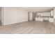 Open concept living room with wood floors, recessed lights, and view of kitchen at 18773 E Panchito Dr, Gold Canyon, AZ 85118