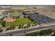 Aerial view showcases location near school, parking and fields at 18811 E Pelican Ct, Queen Creek, AZ 85142