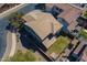 Aerial view of the backyard and new tile roof of this beautiful home located in a well-manicured neighborhood at 18811 E Pelican Ct, Queen Creek, AZ 85142