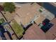 Aerial view showcases tile roof, backyard layout, and new roof at 18811 E Pelican Ct, Queen Creek, AZ 85142