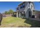 Spacious backyard with a covered patio and lush green lawn, offering a great space for outdoor enjoyment at 18811 E Pelican Ct, Queen Creek, AZ 85142