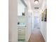 Hallway with carpet, recessed lighting, and laundry nook featuring a white washer and dryer at 19403 E Arrowhead Trl, Queen Creek, AZ 85142