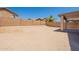 Large, fenced backyard with covered patio and plenty of space for customization at 22196 W Tonto St, Buckeye, AZ 85326