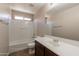 A bathroom featuring a shower/tub combo and vanity at 22196 W Tonto St, Buckeye, AZ 85326