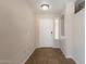 Welcoming entryway featuring tile flooring, neutral paint, and a front door for a clean and modern look at 22196 W Tonto St, Buckeye, AZ 85326