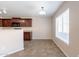 Bright eating area off kitchen featuring tile flooring, natural light, and seamless transition from cooking to dining at 22196 W Tonto St, Buckeye, AZ 85326
