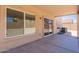 Covered patio featuring concrete flooring and providing easy access to the interior and backyard at 22196 W Tonto St, Buckeye, AZ 85326