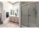 Bathroom featuring a double sink vanity and glass enclosed shower at 23756 S Vacation Way, Sun Lakes, AZ 85248