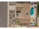 Aerial view of the property featuring a sparkling blue pool, well-maintained landscaping, and a relaxing hot tub at 2422 W Acoma Dr, Phoenix, AZ 85023