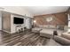 Comfortable living room with a large sectional sofa at 2422 W Acoma Dr, Phoenix, AZ 85023
