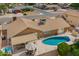 Backyard pool with covered patio and outdoor seating at 2422 W Acoma Dr, Phoenix, AZ 85023