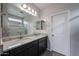 Bathroom featuring a double vanity with granite countertops and tile floors, providing a luxurious experience at 2586 E Music Mountain Ave, Apache Junction, AZ 85119
