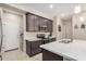 Well-appointed kitchen with an island, stainless steel appliances, and sleek countertops at 2631 S Sulley Dr # 104, Gilbert, AZ 85295