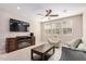 Bright, open living room with tile floors, recessed lighting, and comfortable seating at 2631 S Sulley Dr # 104, Gilbert, AZ 85295
