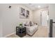 Relaxing loft with a comfortable sofa and stylish decor, perfect for unwinding or entertaining guests at 2631 S Sulley Dr # 104, Gilbert, AZ 85295
