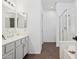 Bright bathroom features a double sink vanity and glass enclosed shower at 28814 N 45Th St, Cave Creek, AZ 85331