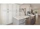 Bright kitchen with stainless steel appliances, gray cabinets, and a marble-look island at 28814 N 45Th St, Cave Creek, AZ 85331