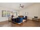 Bright living room features large windows, tile floors, vaulted ceilings, and comfortable seating at 28814 N 45Th St, Cave Creek, AZ 85331