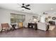 Living room features hard floors, neutral tones, lots of seating and a big window at 28814 N 45Th St, Cave Creek, AZ 85331