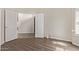 Spacious bedroom features wood-look flooring and neutral paint palette at 3109 N Meadow Dr, Avondale, AZ 85392
