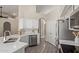 This bright kitchen features stainless steel appliances and white countertops at 3109 N Meadow Dr, Avondale, AZ 85392