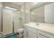 Clean bathroom with a glass-enclosed shower, white vanity, and modern fixtures, offering a spa-like feel at 3247 E Creosote Ln, Gilbert, AZ 85298