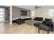 Modern living room with hardwood floors, neutral colors, and comfortable seating at 3247 E Creosote Ln, Gilbert, AZ 85298