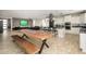 Open-concept living space featuring a modern kitchen, dining area, and comfortable seating at 3247 E Creosote Ln, Gilbert, AZ 85298