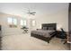 Spacious main bedroom with carpet, windows, and a neutral color scheme creating a serene atmosphere at 3247 E Creosote Ln, Gilbert, AZ 85298