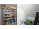 Pantry with metal shelves stocked with drinks, snacks, and boxes at 3247 E Creosote Ln, Gilbert, AZ 85298