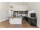 This kitchen offers stainless appliances, black cabinets, and granite countertop island at 351 N Danyell Dr, Chandler, AZ 85225