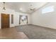 Spacious living room features high ceilings, large windows and plush gray carpeting at 351 N Danyell Dr, Chandler, AZ 85225