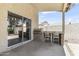 Covered patio with a built-in grill area, ideal for outdoor cooking and dining experiences at 351 N Danyell Dr, Chandler, AZ 85225