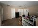 Spacious bedroom with several closets and neutral paint at 41228 W Little Dr, Maricopa, AZ 85138