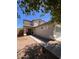 Two-story home featuring desert landscaping, covered entry way, and a two car garage at 41228 W Little Dr, Maricopa, AZ 85138