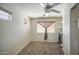 Bedroom with carpet, ceiling fan, window blinds, and neutral wall colors at 43822 W Baker Dr, Maricopa, AZ 85138