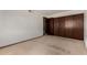 Bedroom featuring neutral carpeting and a spacious closet at 4630 N 68Th St # 264, Scottsdale, AZ 85251