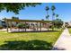 Community common area featuring a shaded picnic area and well-maintained landscaping at 4630 N 68Th St # 264, Scottsdale, AZ 85251