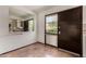 Dining area with tile floors and a view to the kitchen and front door at 4630 N 68Th St # 264, Scottsdale, AZ 85251