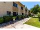 Charming townhome featuring a well-kept lawn and a cozy front entrance, perfect for a relaxed lifestyle at 4630 N 68Th St # 264, Scottsdale, AZ 85251