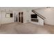 Bright living room with a modern fireplace and adjacent kitchen view at 4630 N 68Th St # 264, Scottsdale, AZ 85251